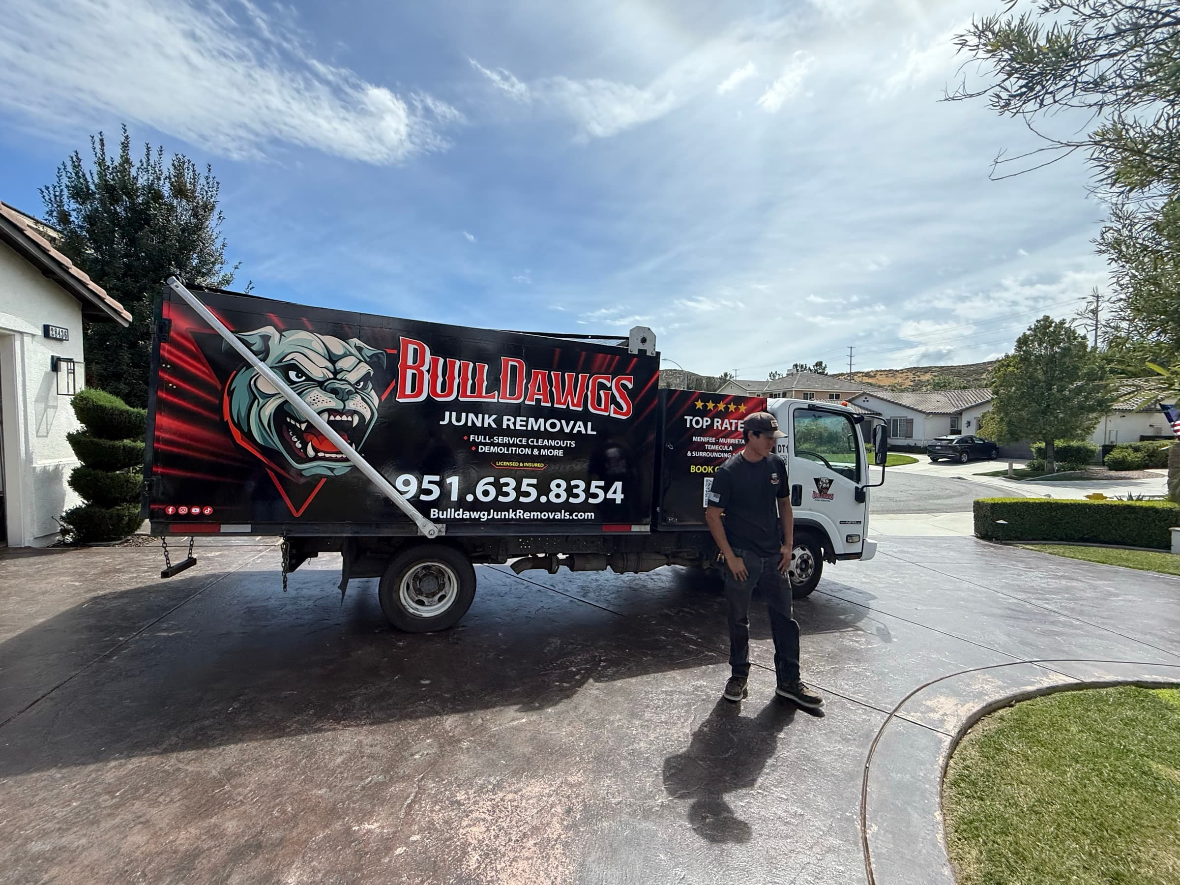 BullDawgs dump truck parked at a residential driveway in Southwest Riverside County, ready for an 18-yard rental