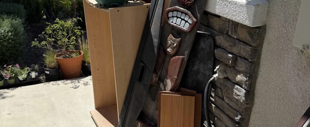 household junk stacked curbside for removal service