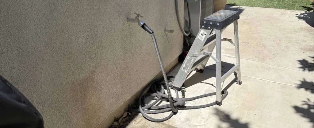 side yard with stool and clean concrete after junk removal