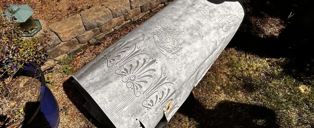 Old metal duct left on yard for junk pickup and removal