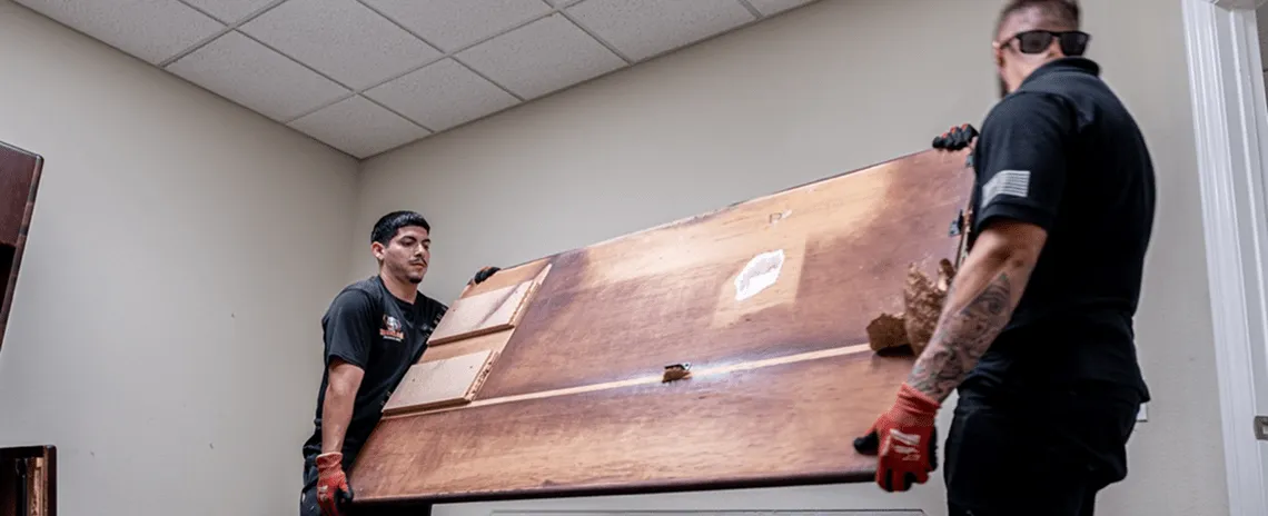 bulldawgs removing damaged desk min